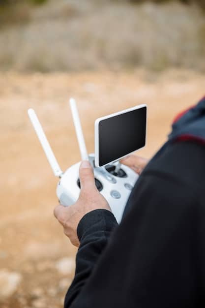 A close-up of a drone with a Remote ID broadcast module attached, highlighting the device's size and placement.