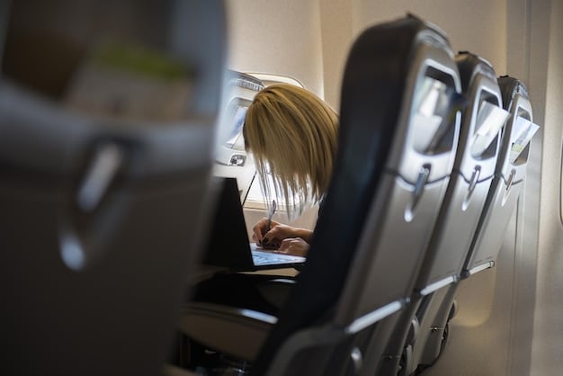 Interior shot of a modern low-cost carrier airplane cabin, showcasing the seating arrangement, overhead compartments, and passengers enjoying their flight.
