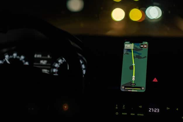 A close-up view of an augmented reality dashboard projecting a lane departure warning onto the windshield, highlighting the lane markings in green and showing an alert icon when the vehicle veers off course.