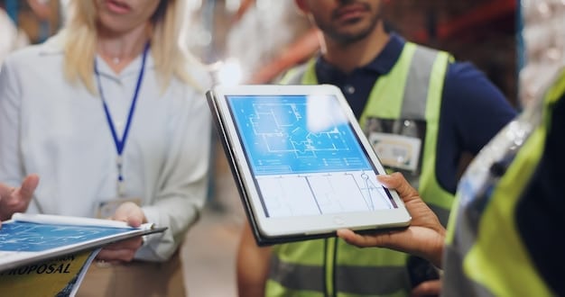 A group of engineers and government officials examining a V2X system dashboard, with data visualizations showing traffic flow and safety metrics.