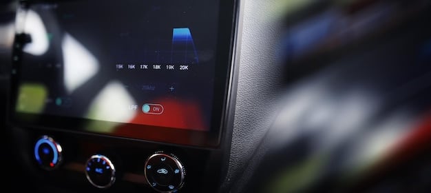 A close-up view of a car's front grille, showing the integration of radar sensors. The image highlights the compact design and seamless integration of the radar technology into the vehicle's aesthetics.