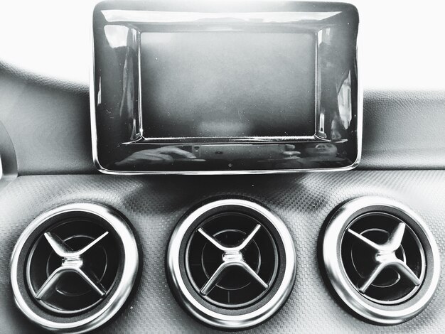 A collection of customized car badges and emblems, each with unique designs, materials, and finishes, showcasing the attention to detail in personalizing a vehicle.