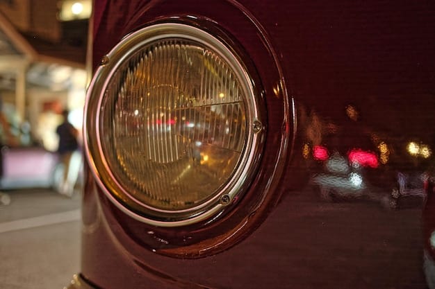 A close-up shot of a vintage car's headlamp, showcasing the intricate details of the design and the warm glow of the light, set against a blurred background.