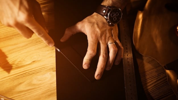 A close-up shot of skilled hands meticulously sewing a piece of leather upholstery. The needle is precisely placed, and the thread is taut. The background is blurred, focusing attention on the craftsman's hands and the quality of the stitching.