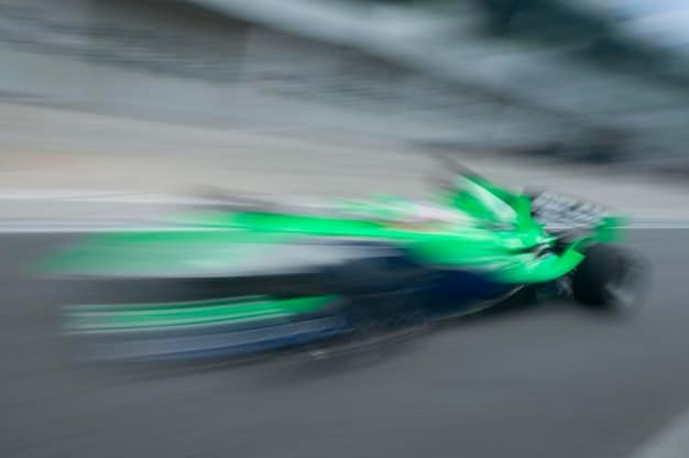 Action shot of a rider expertly maneuvering the Zero SR/F through a series of tight turns on a racetrack, highlighting its responsive handling and agile performance capabilities.