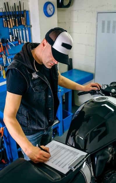 A mechanic inspecting the regulator/rectifier of a Suzuki SV650, with a multimeter connected to check the voltage. The image focuses on the technical aspect of diagnosing electrical issues.