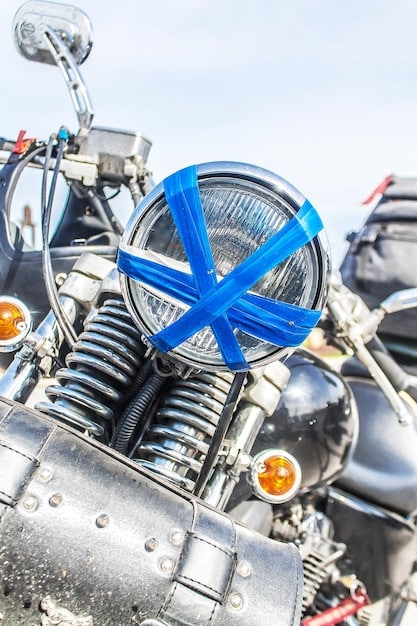 A close-up shot of the engine of a used Suzuki SV650, highlighting areas that should be inspected for potential problems, such as leaks or damage.