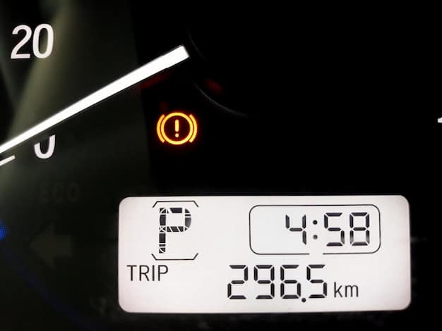 Close-up of the 2024 KTM 390 Adventure's digital display showing riding information such as speed, gear, and navigation. The background is blurred to emphasize the clarity and features of the display.