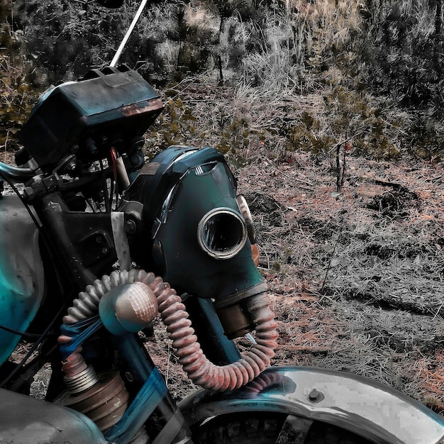 The 2024 Royal Enfield Himalayan parked on a rocky off-road trail. The motorcycle's sturdy frame and rugged tires are visible, emphasising its off-road capabilities.