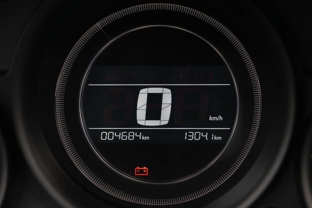 A close-up shot of the 2024 Honda CBR650R's digital instrument panel, clearly showing the speedometer, tachometer, gear indicator, and other essential information. The panel is backlit for enhanced visibility.