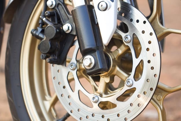 A close-up of the 2024 Honda CBR650R's front brake setup, showcasing the dual radial-mount calipers and floating rotors. The image highlights the bike's braking components.